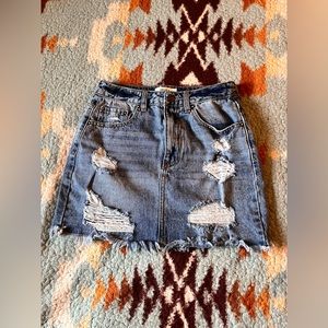 Ripped Denim Mini Skirt
